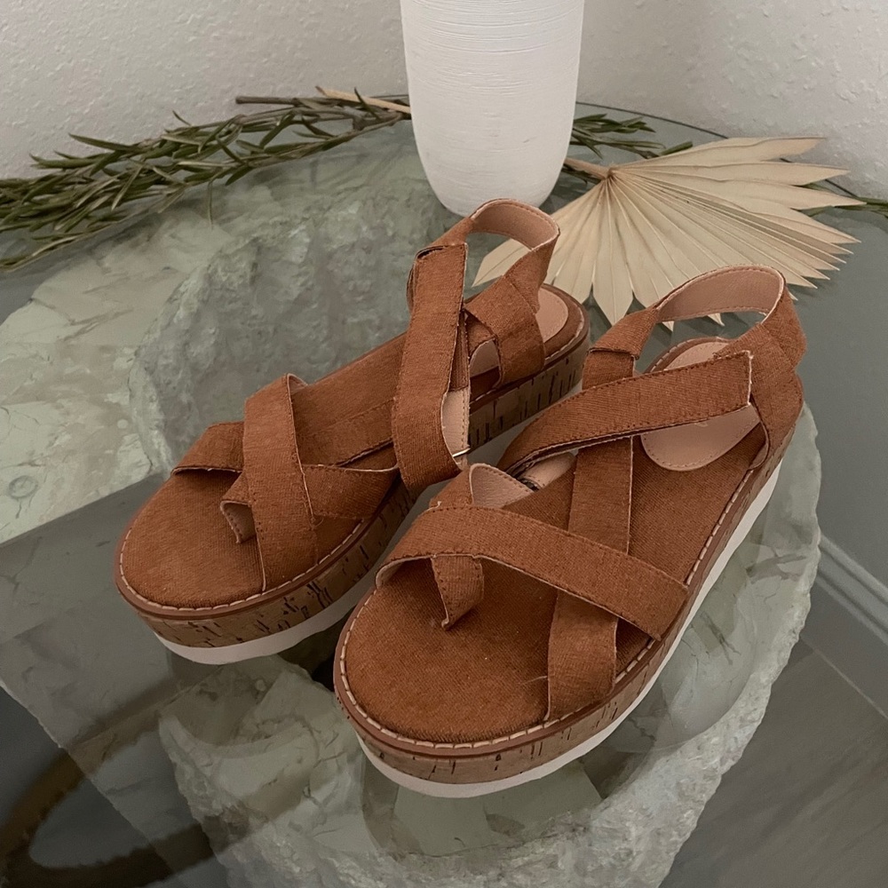 Tan, platform sandal with supportive strap details
